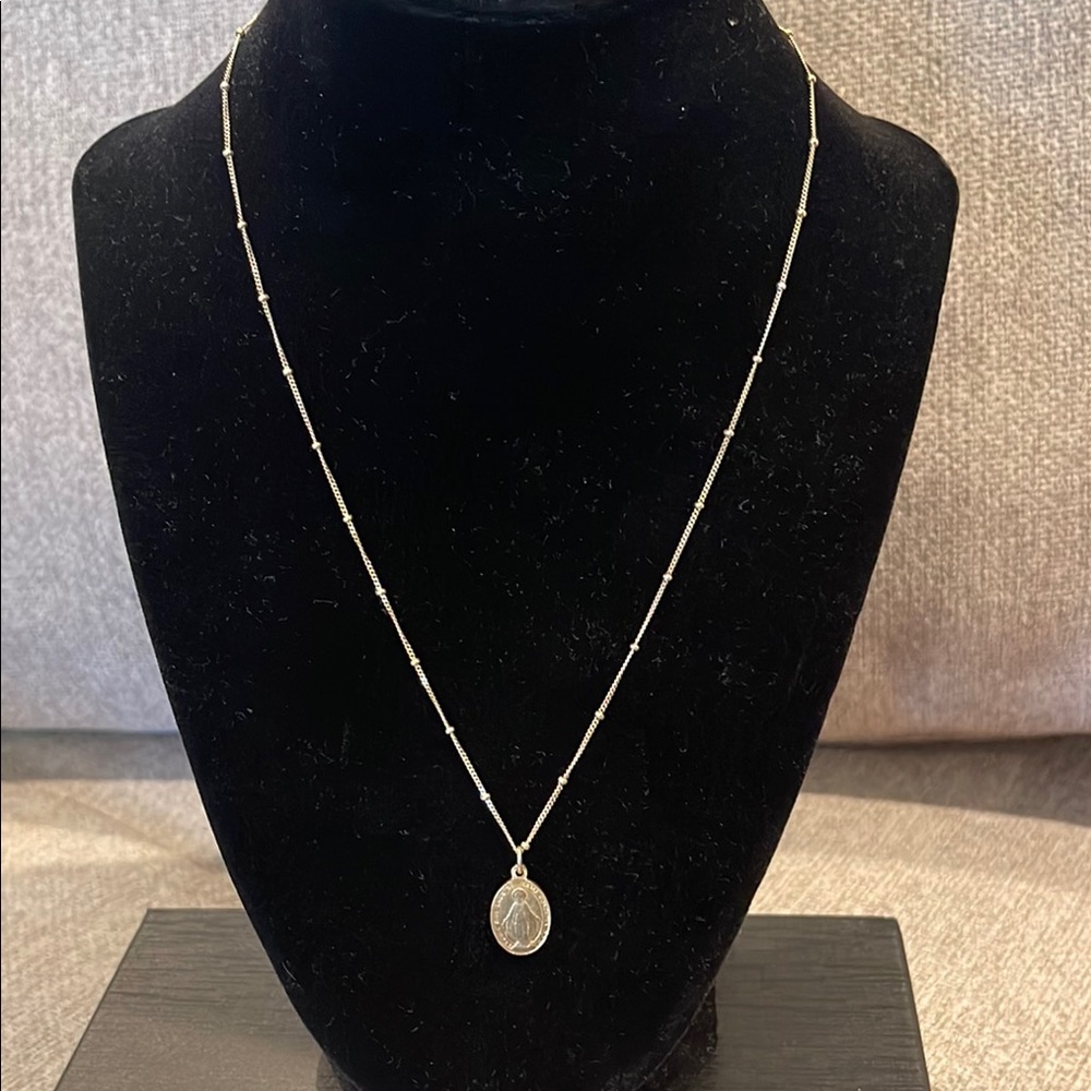 Gold tone rosary with decorative necklace 20”